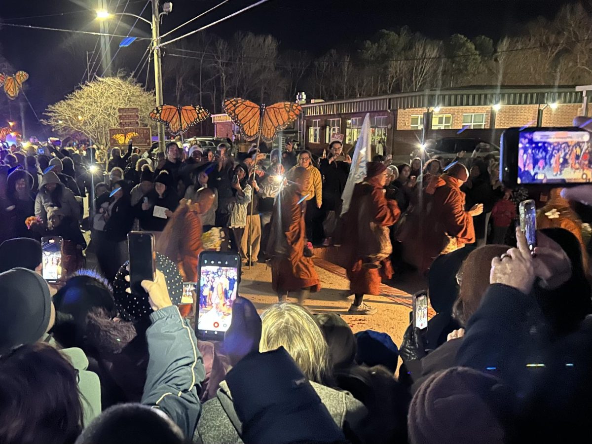 Venerable Monks walking into Jordan-Matthews High School on Jan. 21